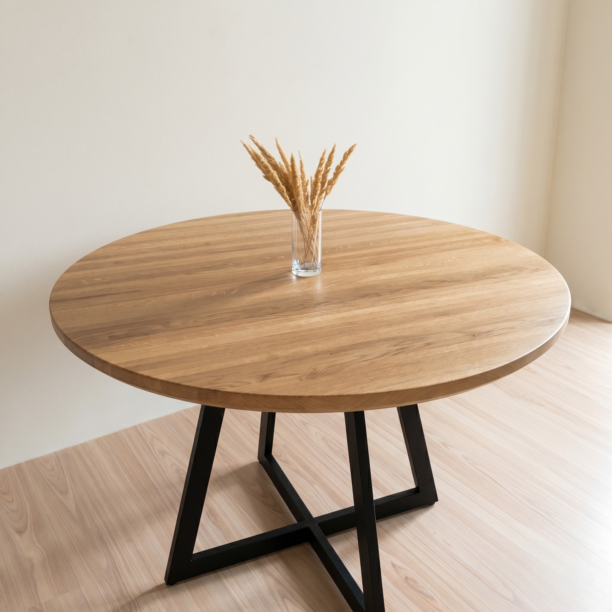 Round Solid Oak Coffee Table with Geometric Black Steel Cross Base