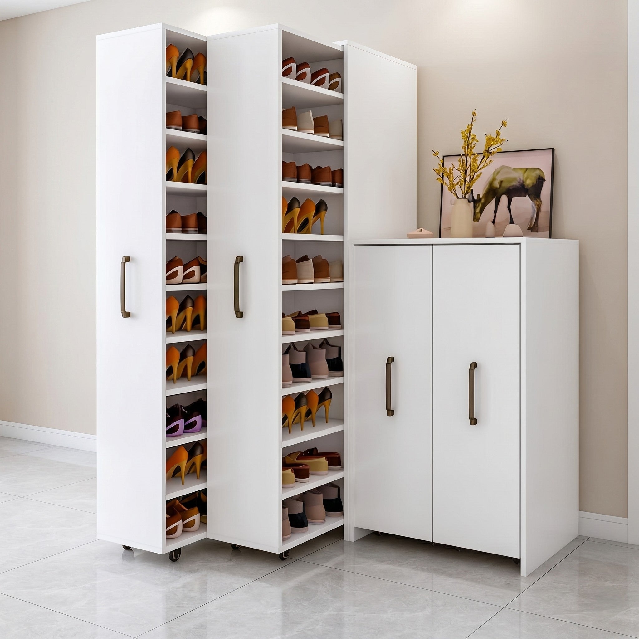 White Matte Modular Shoe Storage System with Two Full-Height Rolling Shoe Towers and One Low Two-Door Cabinet with Display Top
