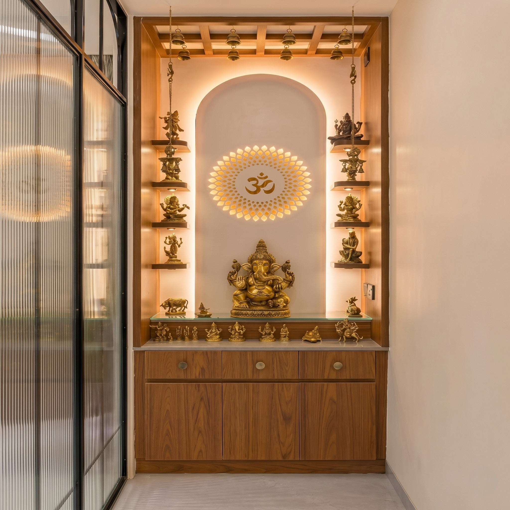 Walnut Full-Height Alcove Ganesha Mandir with Backlit Om Lotus Mandala Arch, Teak Grid Canopy, Eight Suspended Gold Bells, Six Walnut Deity Shelves, Marble Altar and Three Drawers with Two Cabinet Doors